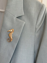 Load image into Gallery viewer, Seahorse broach in copper and silver. 2 inches L by 1/2 inch W.