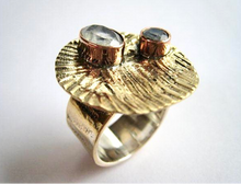 Load image into Gallery viewer, Gold ring with two embedded stones on a white background